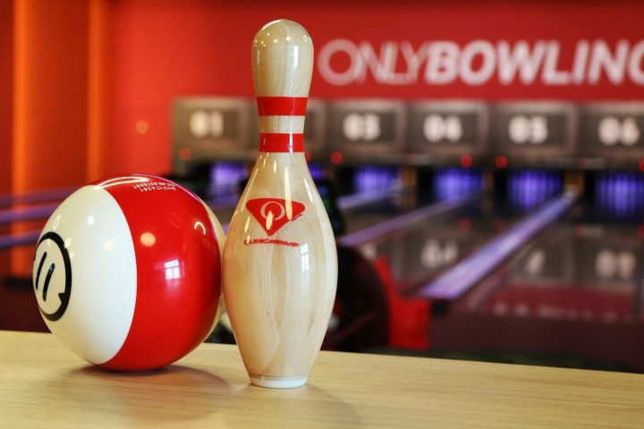 white and red coca cola print bowling pin